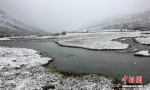 四川稻城亚丁九月飘雪银装素裹 - 中国西藏网